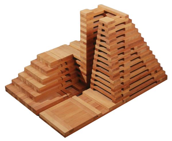 stacked wood scuplture forming irregular pyramid shape