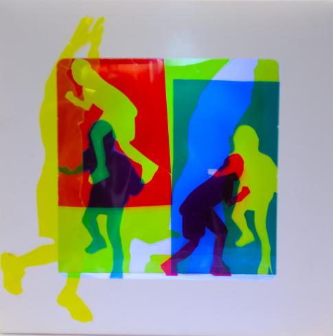 fluorescent light box with neon figurine cutouts  