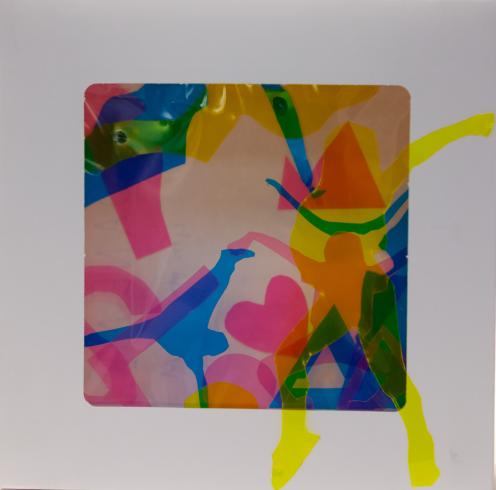 fluorescent light box with neon figurine cutouts  