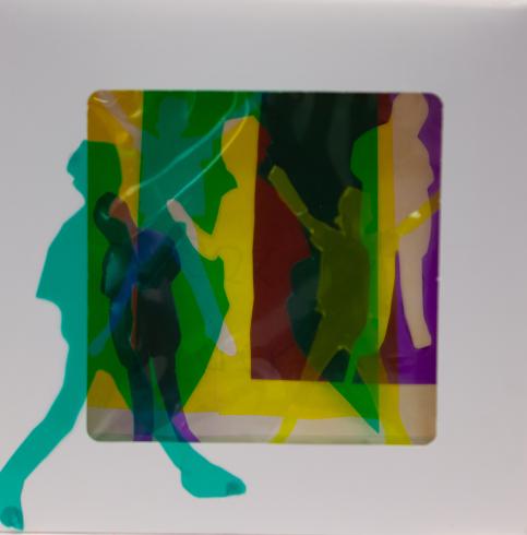 fluorescent light box with neon figurine cutouts  