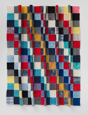 Quilt made of colorful squares 