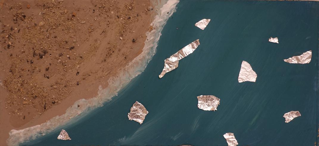 Beach scene with tin foil in the water.