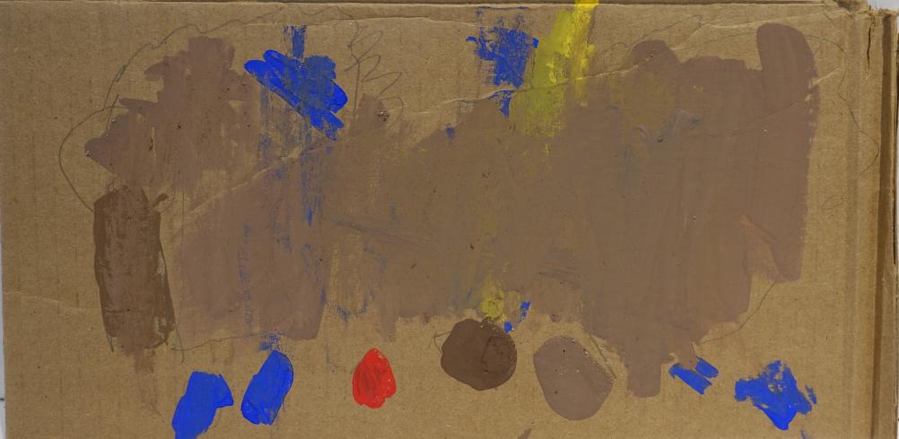 Brown paint surrounded by blue-painted dots.