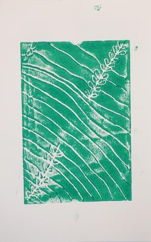 Green print with lines and leaves.