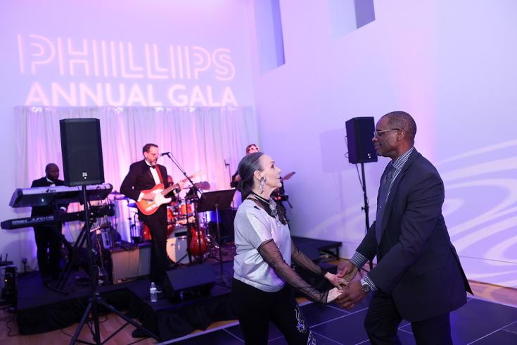 Guests at the Annual Gala After Party wearing black tie