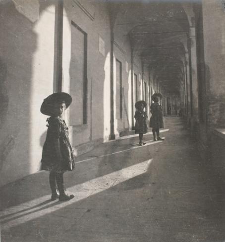 Anne-Marie, Bernadette, and Noele under an arcade, Bologna, October-November