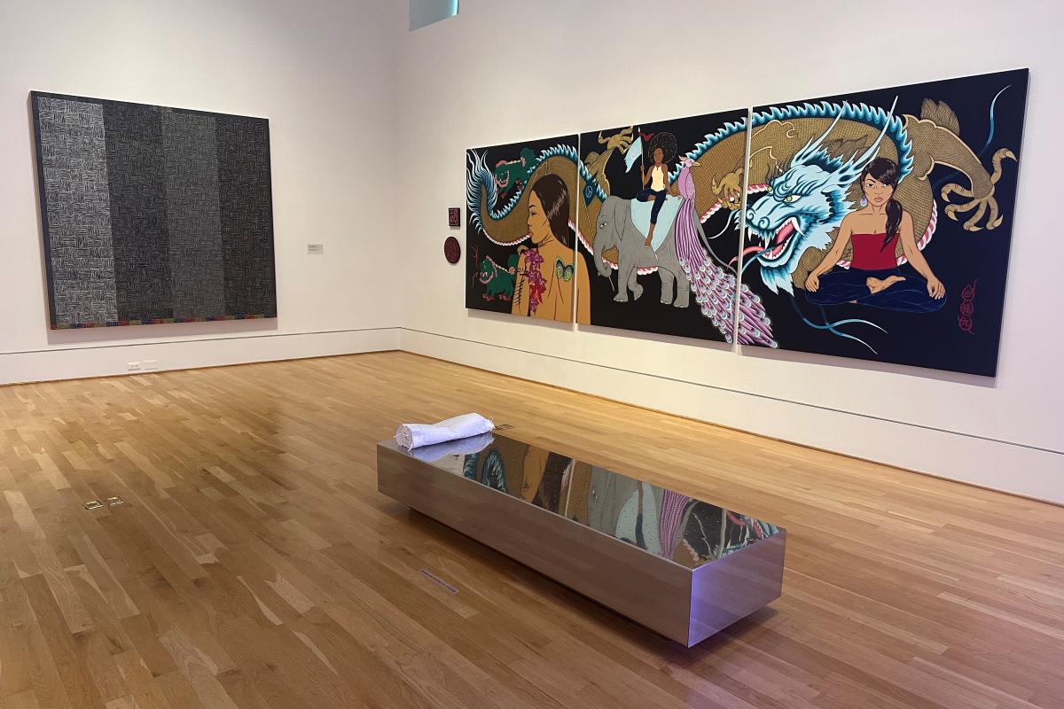 Installation view of artworks by Binion and Beynon on the wall, Soares in the middle of the gallery